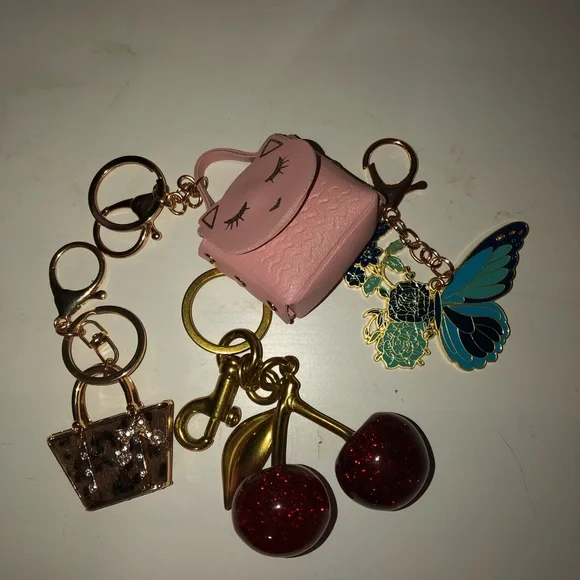 Group of four keychains or/and purse charms. - Picture 2 of 9